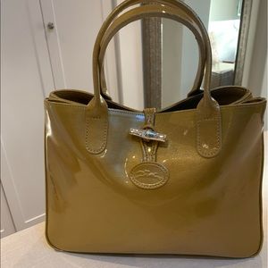 Longchamp gold patent handbag